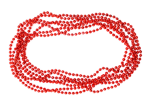 Red beads border isolated. Christmas background. - Foto, afbeelding