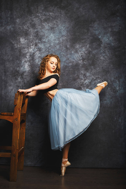 Ballet dancer in blue skirt and Ballet Shoes - 写真・画像