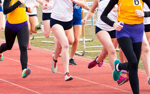 High School Girls racing on a track - Photo, Image