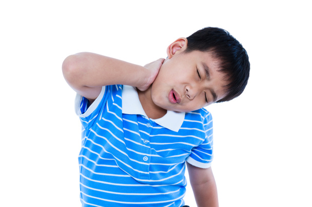Azjatycki chłopiec przystojny mieć ból szyi. Na białym tle - Zdjęcie, obraz