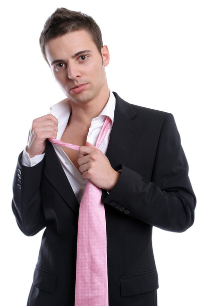 Joven hombre de negocios, arreglando su corbata
 - Foto, imagen