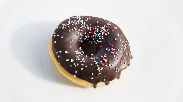 chocolate donut with colorful topping - Fotografie, Obrázek