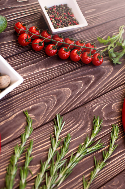 Abstract design background vegetables on a wooden background - Foto, Imagen