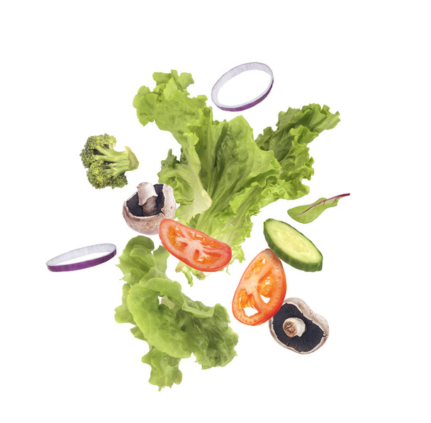 Salad flying on a white background - Photo, Image