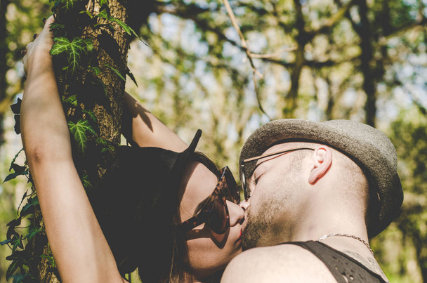 modern boyfriend and girlfriend kissing  - Фото, изображение