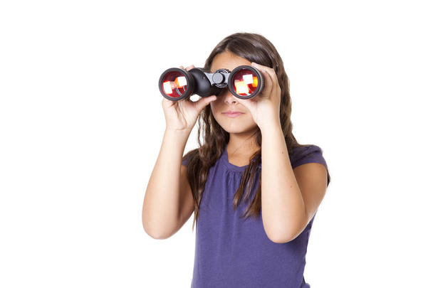 Chica joven usando prismáticos
 - Foto, Imagen
