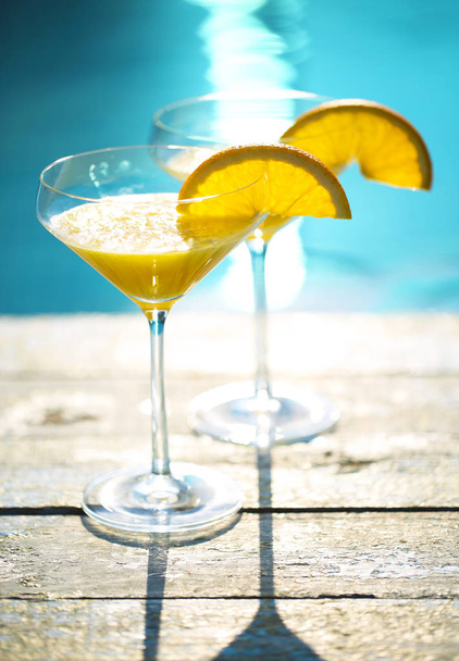 Champagne glasses with orange slice Mimosa cocktail - Photo, Image