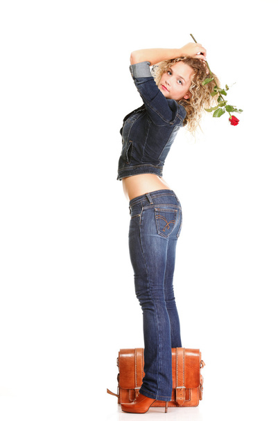 Beautiful young woman blonde in jeans - Фото, зображення