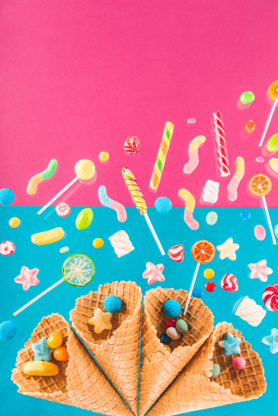 Waffle cones and candies  - Фото, зображення