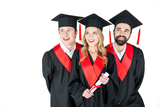 Happy students in mortarboards  - Photo, Image