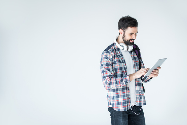 man with headphones and digital tablet - Fotó, kép