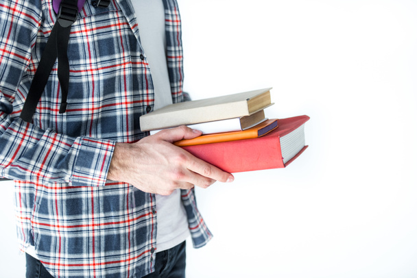 student holding books  - Foto, imagen