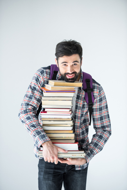 Student mit Bücherstapel - Foto, Bild