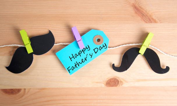 Happy fathers day written on paper tag - Фото, изображение
