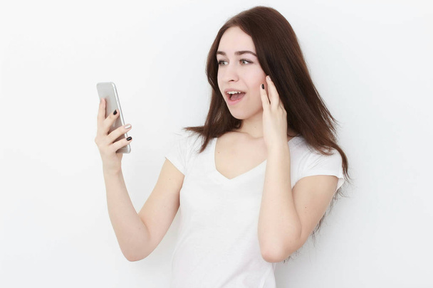 Young beautiful woman using smart phone, - Photo, Image