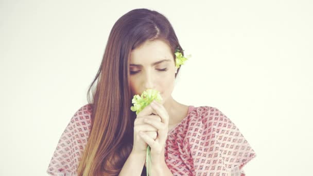 Cute woman smelling flower hippie - Footage, Video