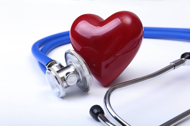 Medical stethoscope and red heart isolated on white background. - Foto, Imagem
