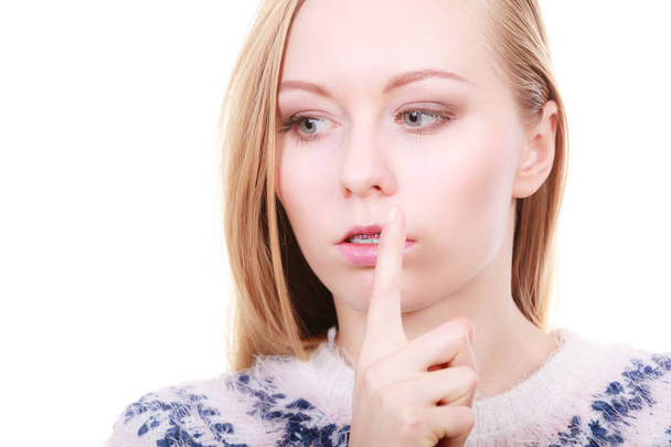 Young blonde woman making silence gesture - Foto, immagini
