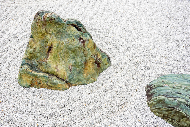 Japanese zen garden meditation stone in lines sand for relaxation - Photo, Image