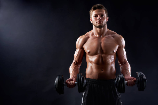 Young fitness man in studio - Photo, image