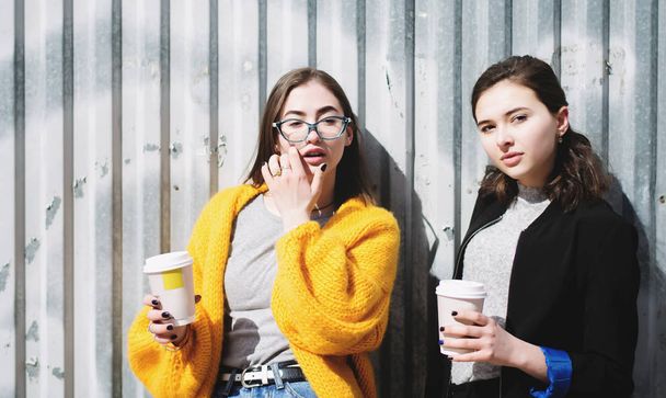 Young girls with coffee  - Фото, изображение