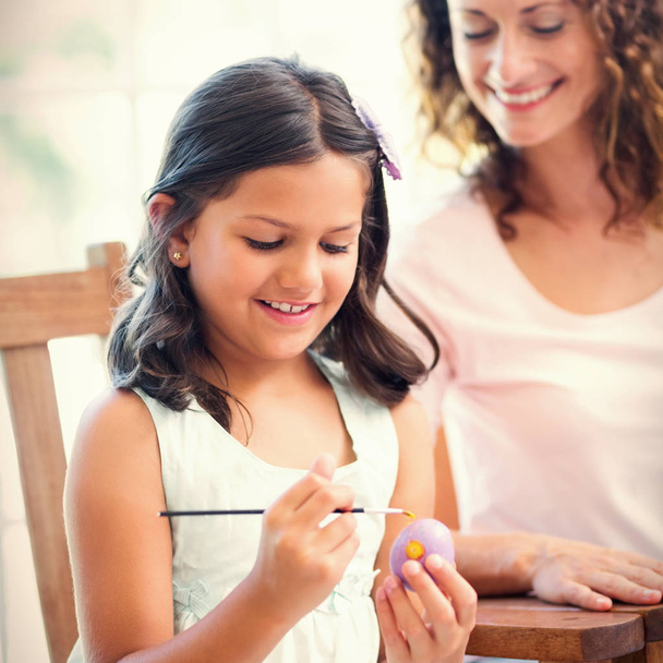 Happy mother and daughter painting easter eggs  - Foto, Imagem