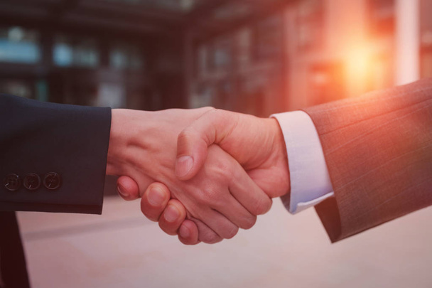 Business colleagues handshaking - Fotó, kép