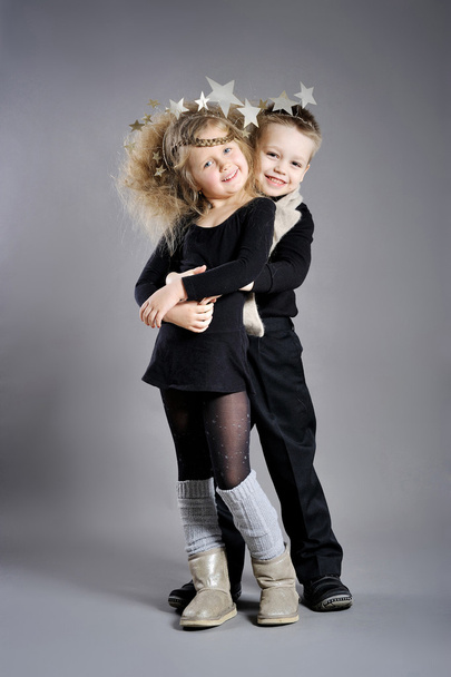 Portrait of little boys and girls in the studio in a Christmas s - Photo, Image