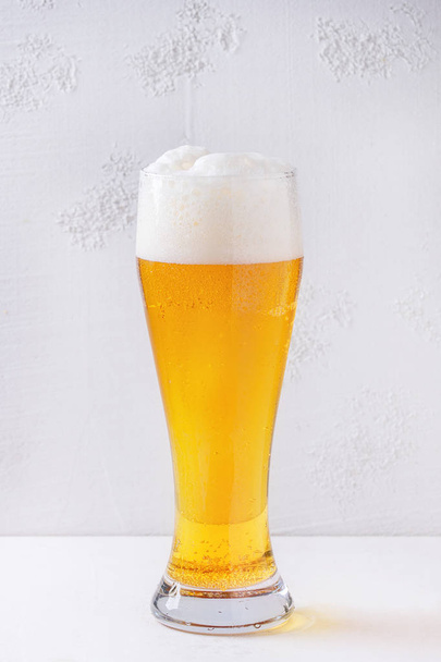 Glass of lager beer - Фото, изображение