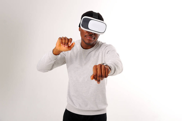 Black guy with virtual reality glasses isolated on white - Photo, Image