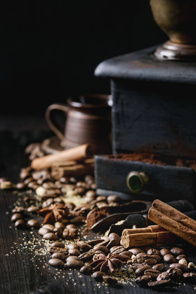 Black coffee beans with spices - Fotó, kép