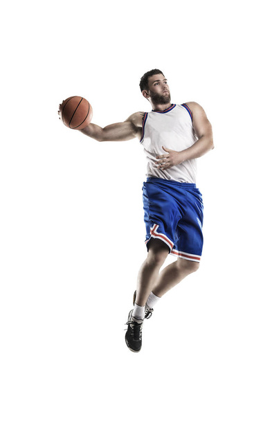 プロバスケット ボール選手ボール ジャンプと白で隔離 - 写真・画像