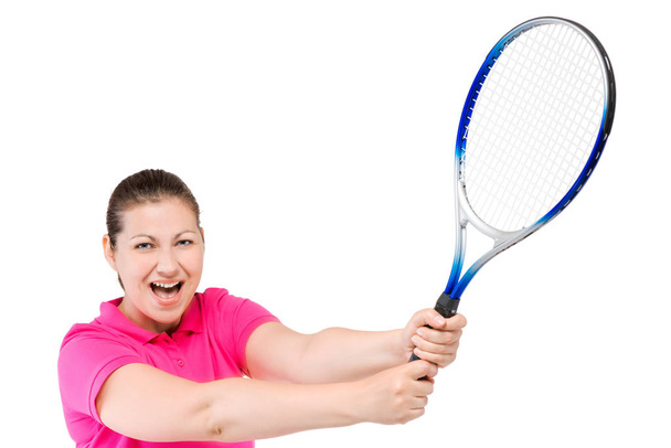 juichende vrouw met een racket voor tennis in de handen op een wit  - Foto, afbeelding