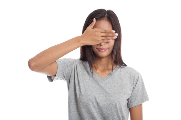 Young Asian woman close her eyes with hand. - Foto, Bild