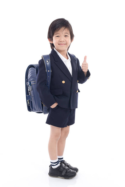 Asiática criança em uniforme escolar
  - Foto, Imagem