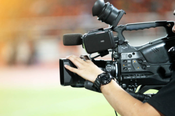 blurry of Professional cameraman and Video camera operator worki - Photo, Image
