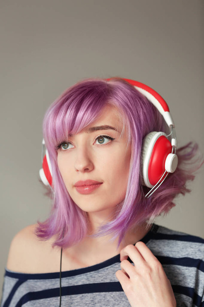 Beautiful young woman with dyed hair   - 写真・画像