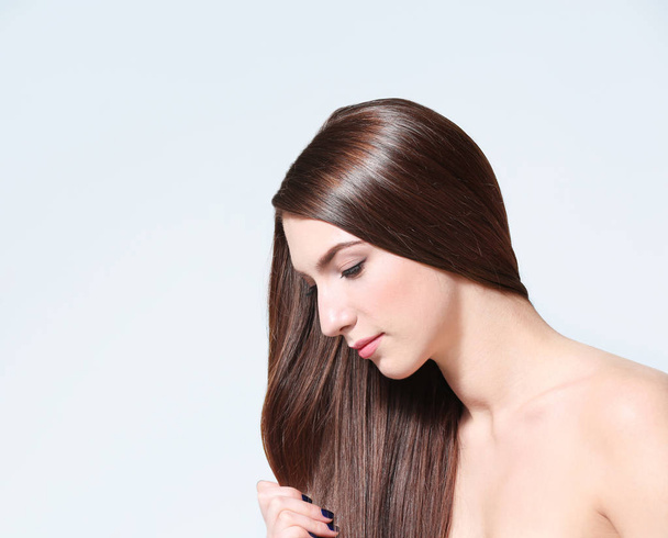 woman with long straight hair  - Foto, Imagen