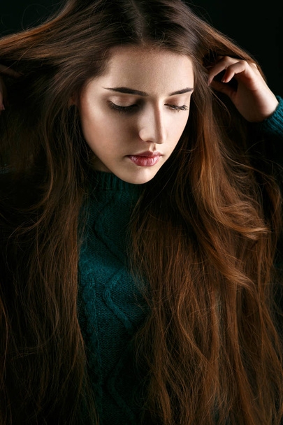 Brunette woman in green sweater  - Photo, Image