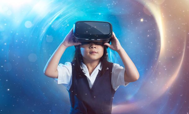 Girl wearing virtual reality goggles - Фото, зображення