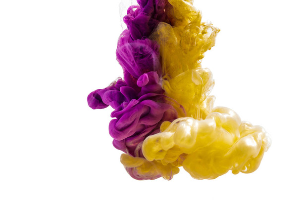 colorful ink isolated on white background. pink yellow  drop swirling under water. Cloud of ink in water. - Foto, Imagem
