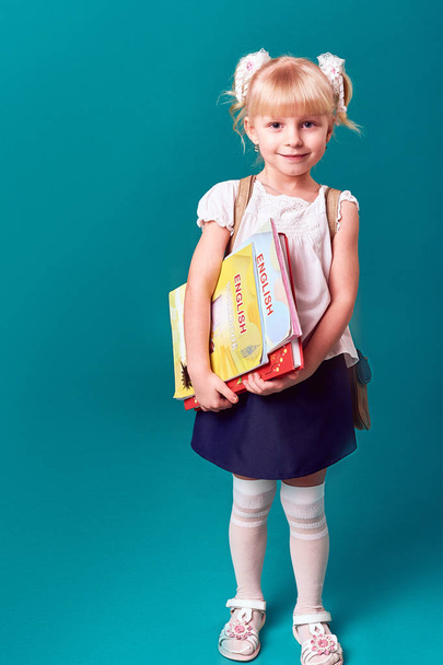 Child with a book - Фото, изображение