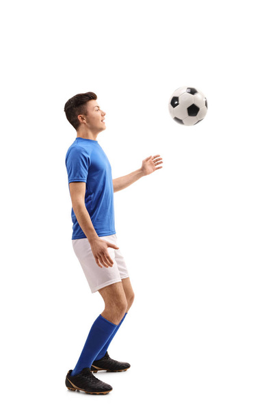 Teenage soccer player with a football - Fotoğraf, Görsel