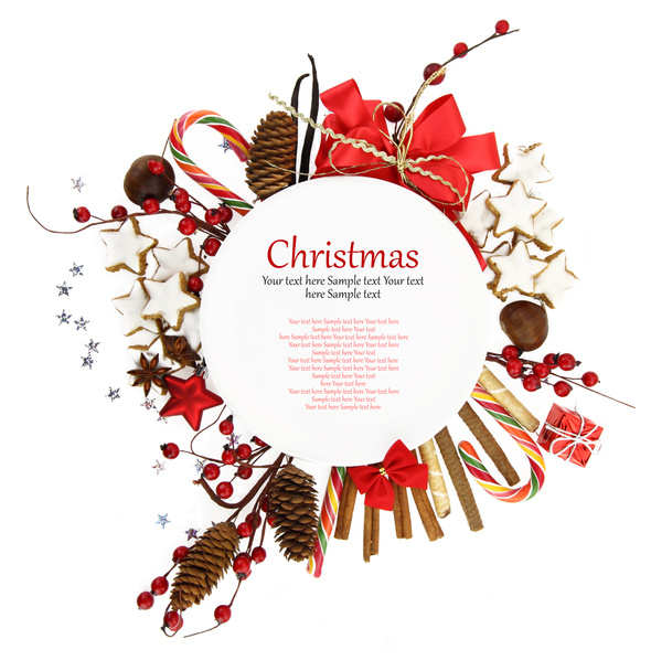 Piatto bianco di Natale con ornamenti e caramelle
 - Foto, immagini