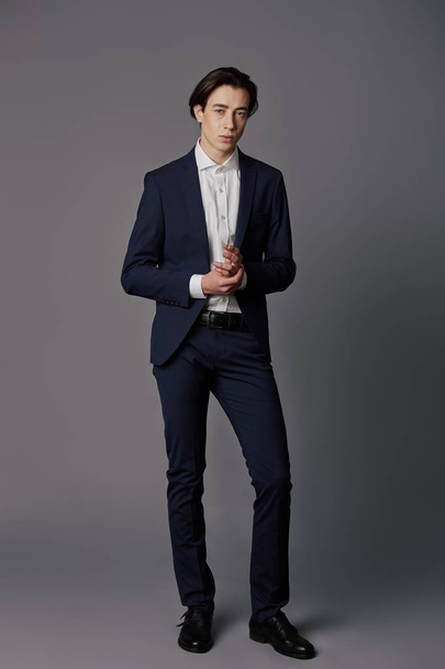 Business fashion man wearing blue suit with white shirt - Zdjęcie, obraz