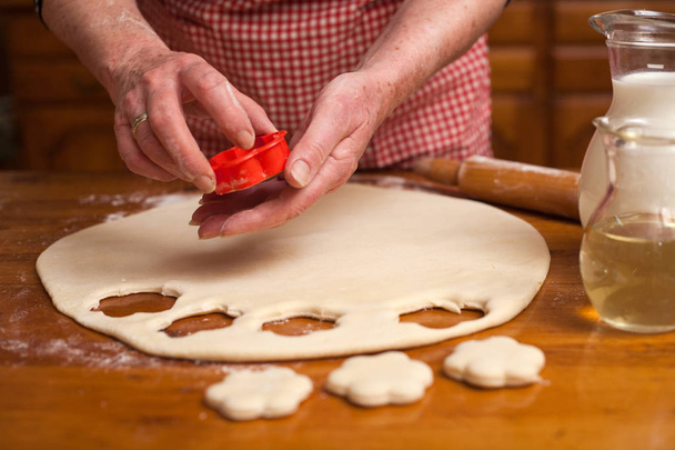 senior woman preparing delicious cookies  - Fotografie, Obrázek