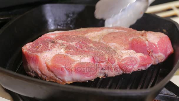 Cooking steak on the grill. BBQ Preparing meat for steak. - Filmati, video