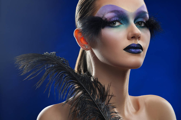 Young woman with fantasy makeup - Foto, afbeelding