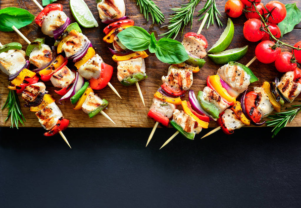 Meat and vegetables party skewers background - Foto, afbeelding