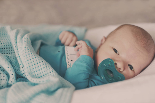 newborn with dummy - Fotografie, Obrázek